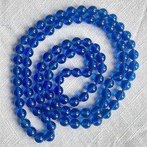 Stunning Cobalt Glass Necklace. Hand tied w/ blue silk, no clasp.